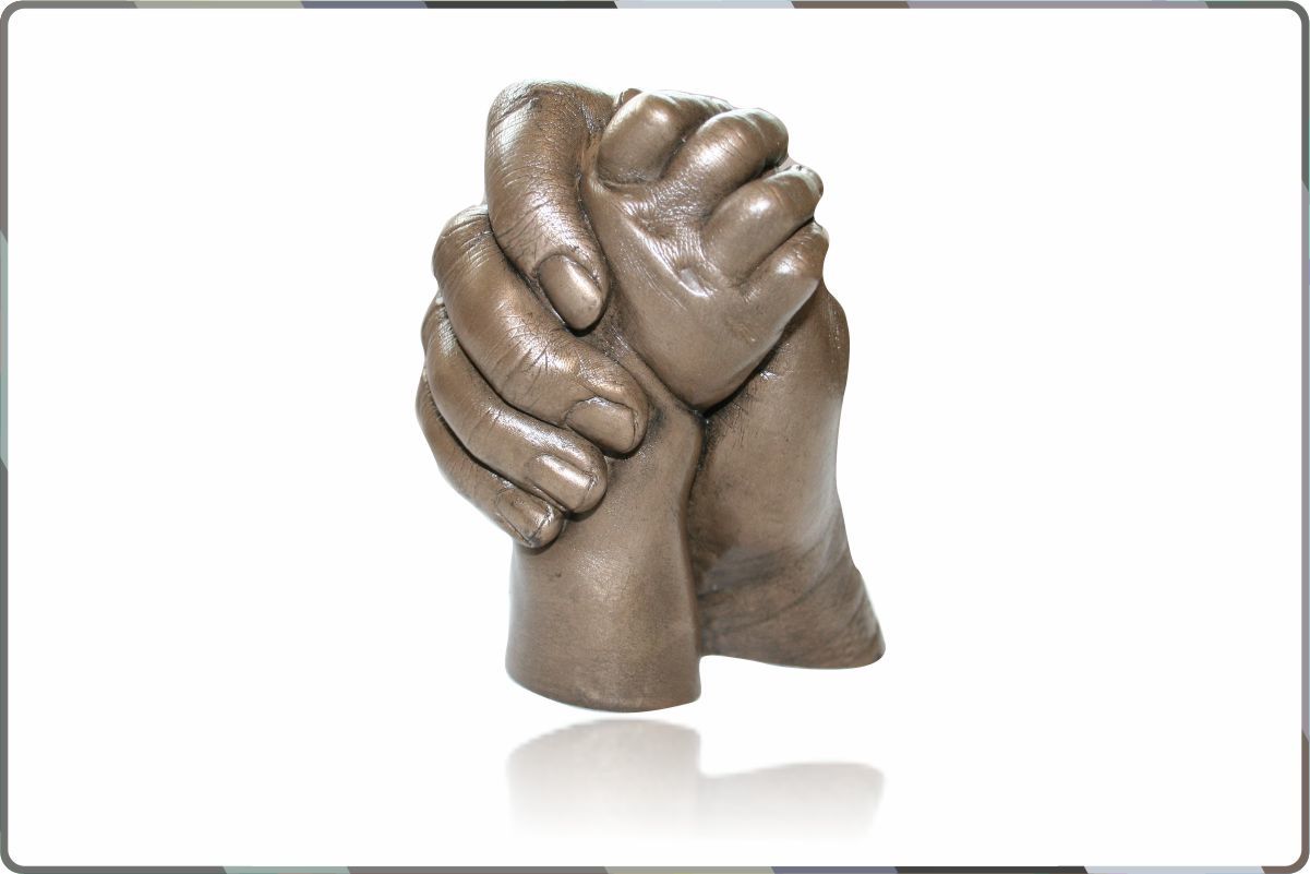 Adults Holding Hands Statue